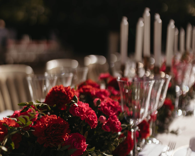 La boda de los claveles rojos y fucsias