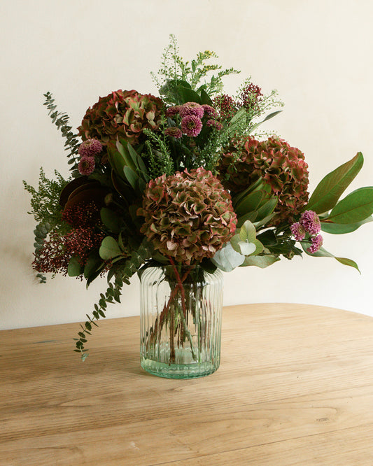 Jarrón con flor natural