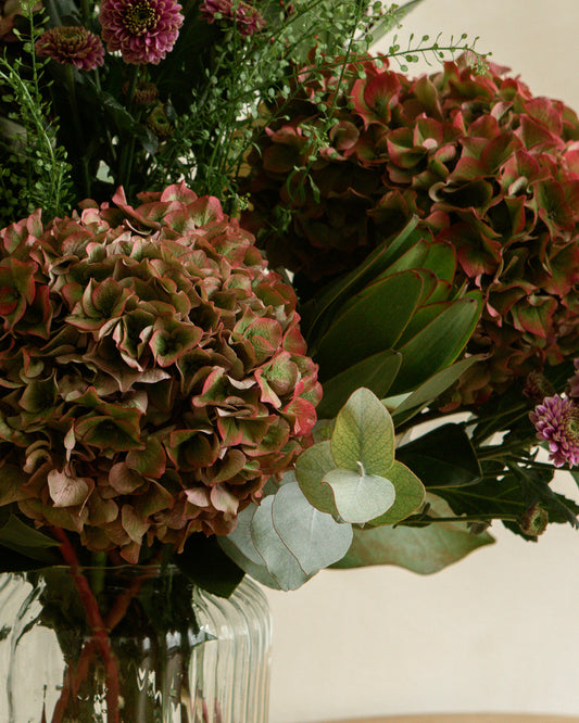 Jarrón con flor natural